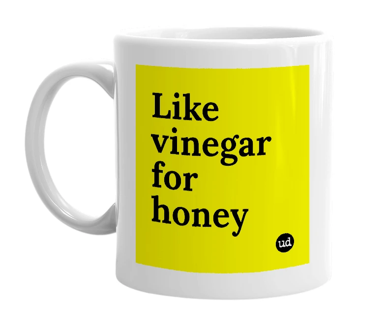White mug with 'Like vinegar for honey' in bold black letters