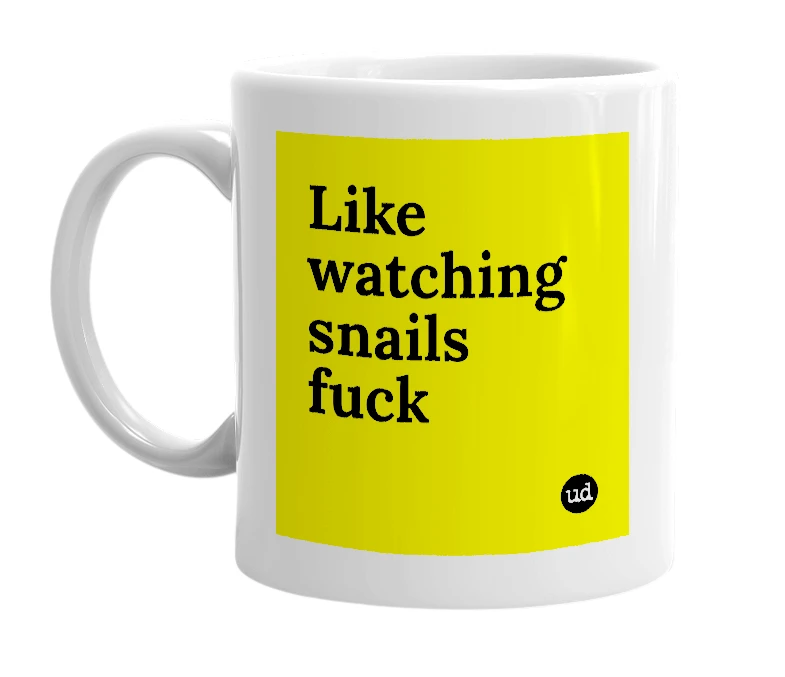 White mug with 'Like watching snails fuck' in bold black letters