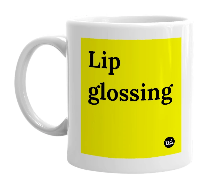 White mug with 'Lip glossing' in bold black letters