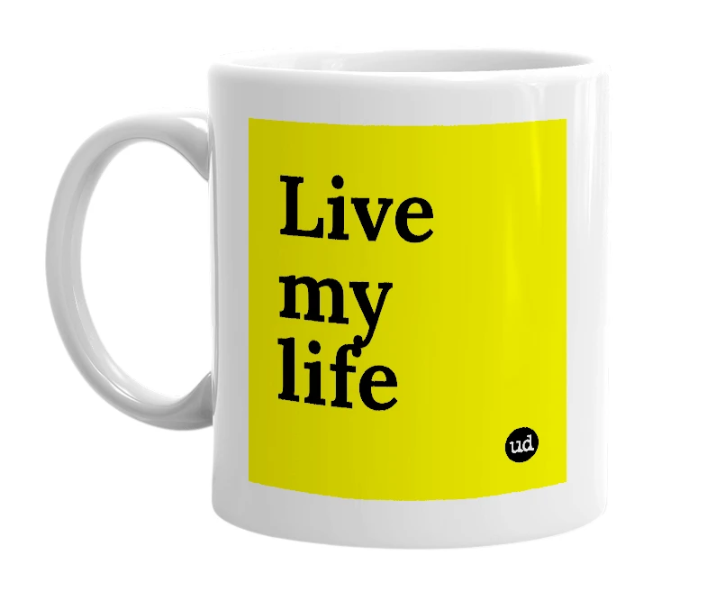 White mug with 'Live my life' in bold black letters