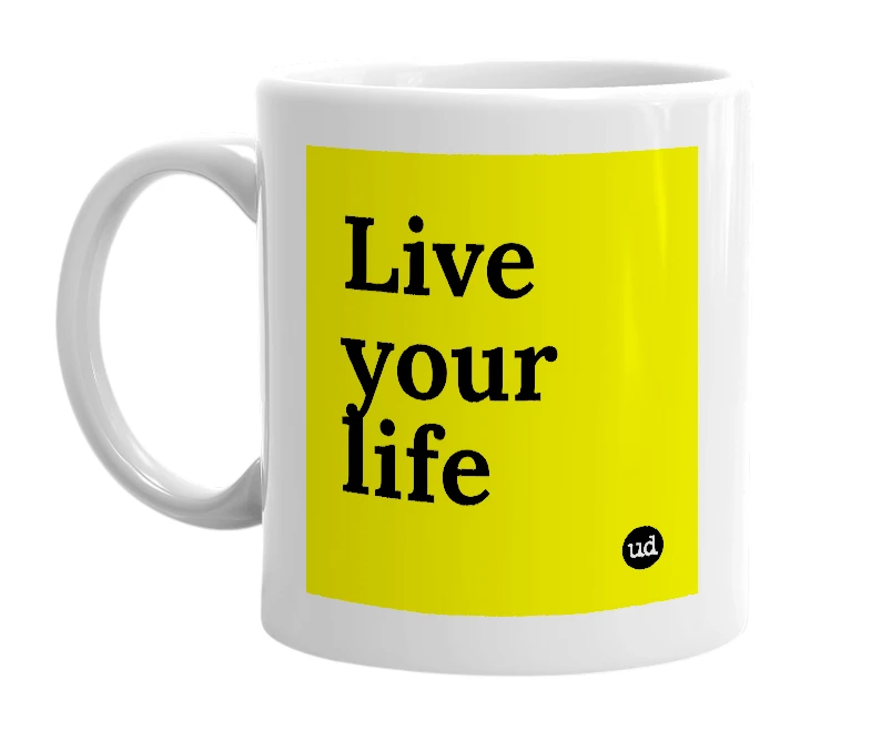 White mug with 'Live your life' in bold black letters