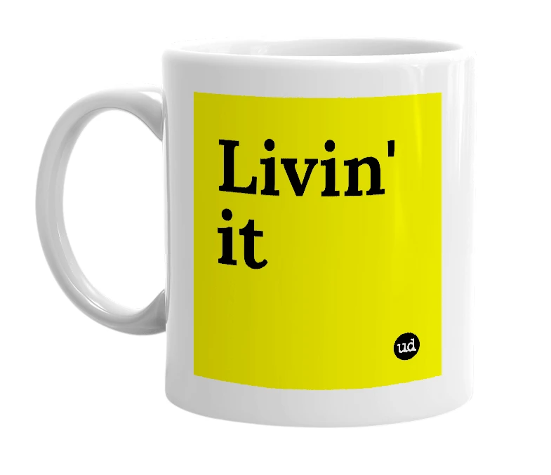 White mug with 'Livin' it' in bold black letters
