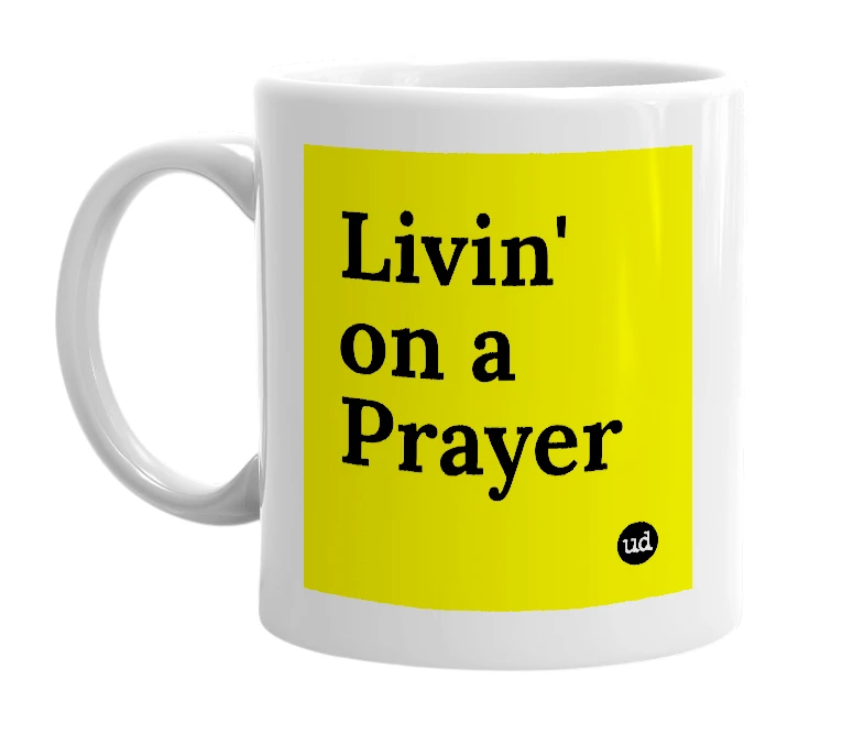 White mug with 'Livin' on a Prayer' in bold black letters