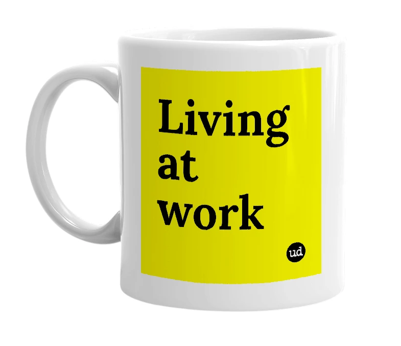 White mug with 'Living at work' in bold black letters