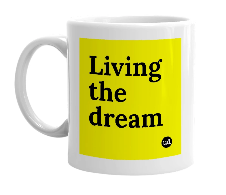 White mug with 'Living the dream' in bold black letters