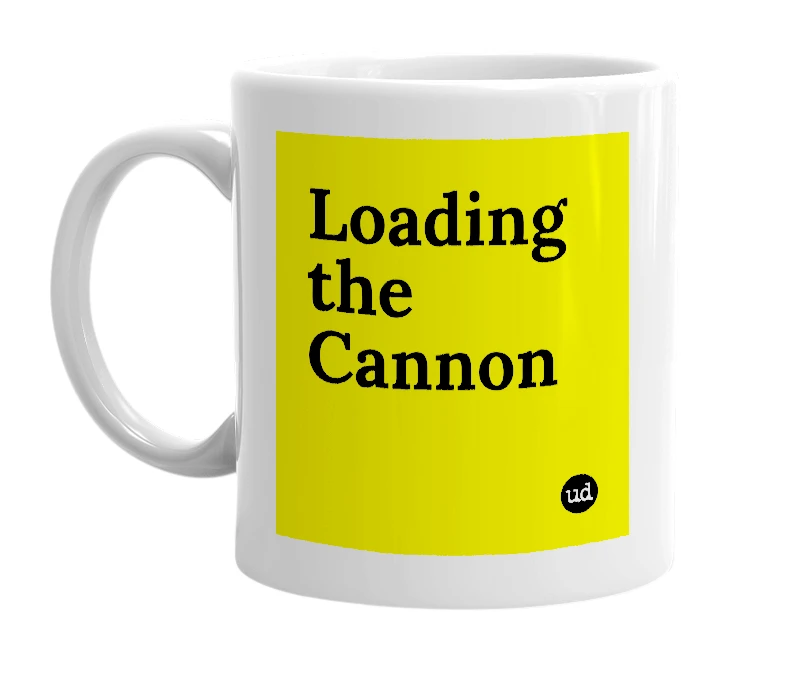 White mug with 'Loading the Cannon' in bold black letters