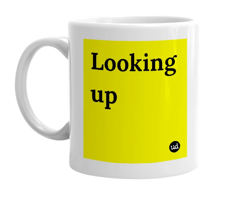 White mug with 'Looking up' in bold black letters