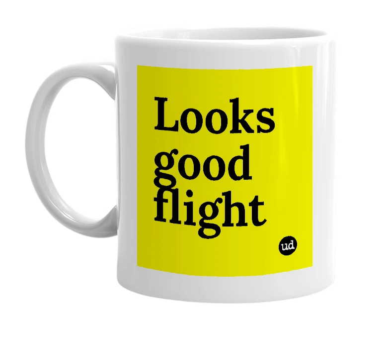 White mug with 'Looks good flight' in bold black letters