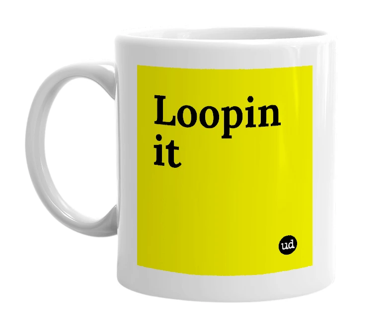 White mug with 'Loopin it' in bold black letters