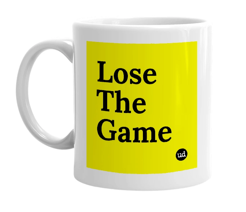 White mug with 'Lose The Game' in bold black letters