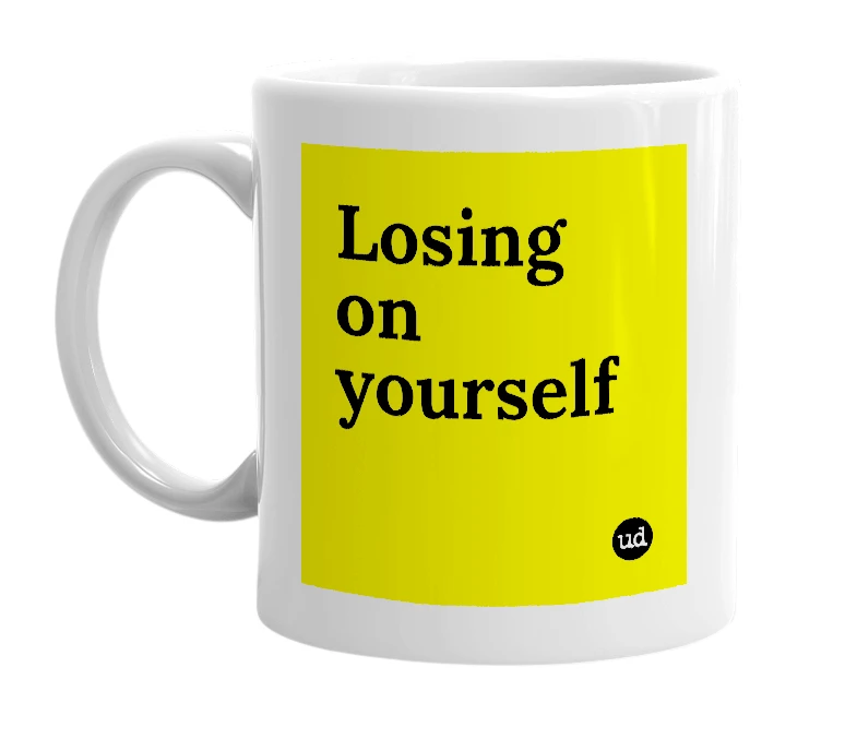 White mug with 'Losing on yourself' in bold black letters