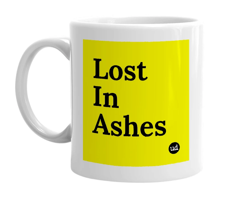 White mug with 'Lost In Ashes' in bold black letters