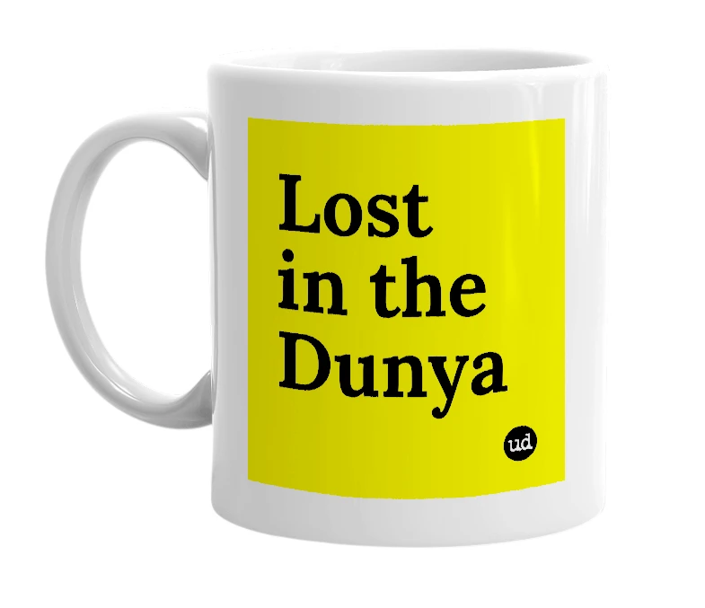 White mug with 'Lost in the Dunya' in bold black letters