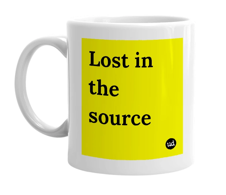 White mug with 'Lost in the source' in bold black letters