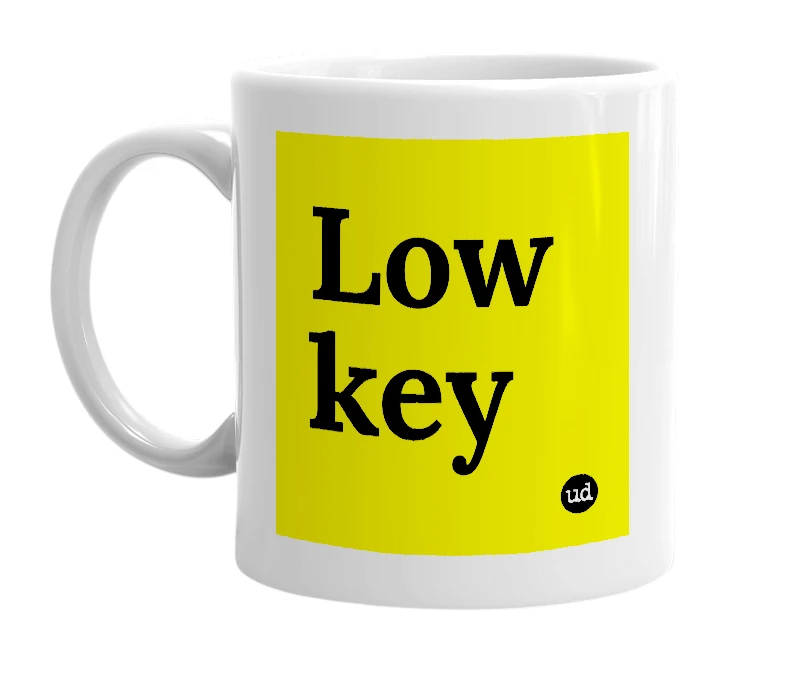 White mug with 'Low key' in bold black letters