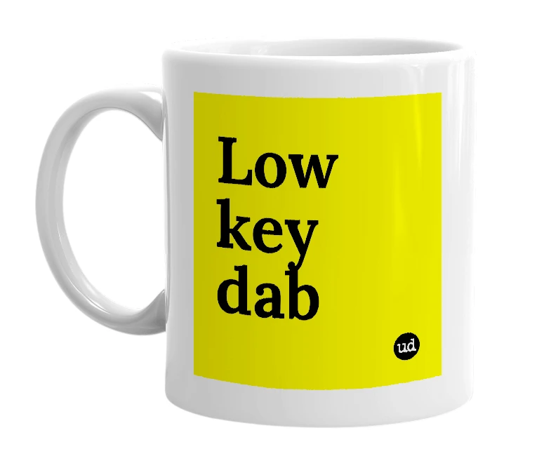 White mug with 'Low key dab' in bold black letters