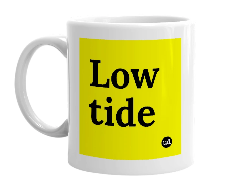 White mug with 'Low tide' in bold black letters