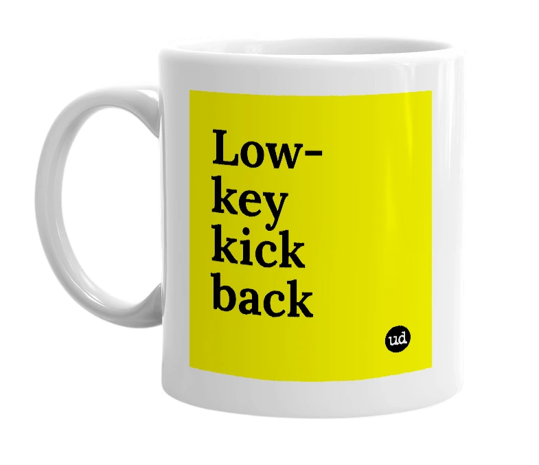 White mug with 'Low-key kick back' in bold black letters