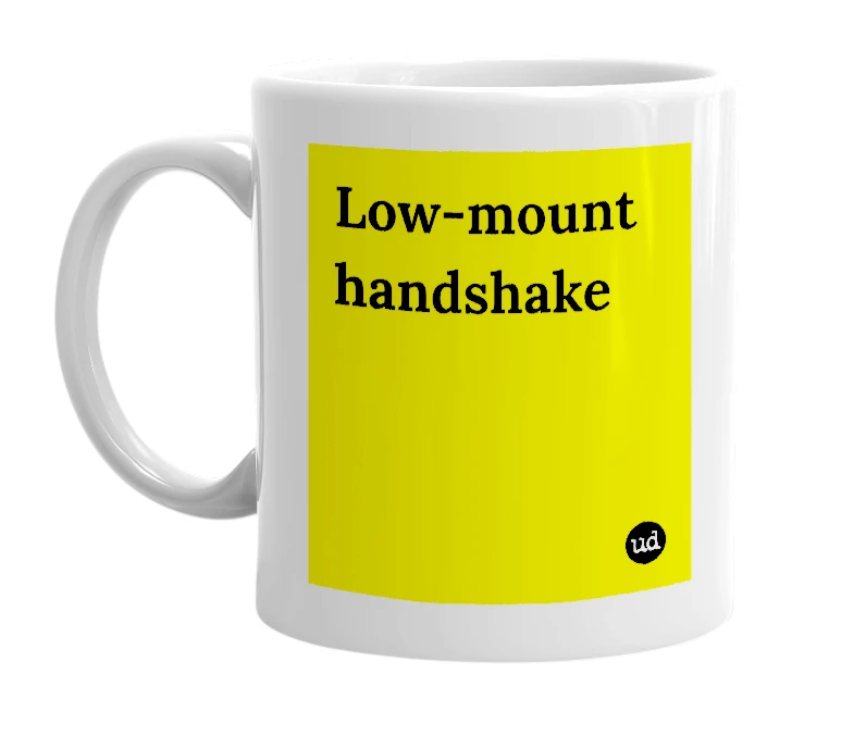 White mug with 'Low-mount handshake' in bold black letters