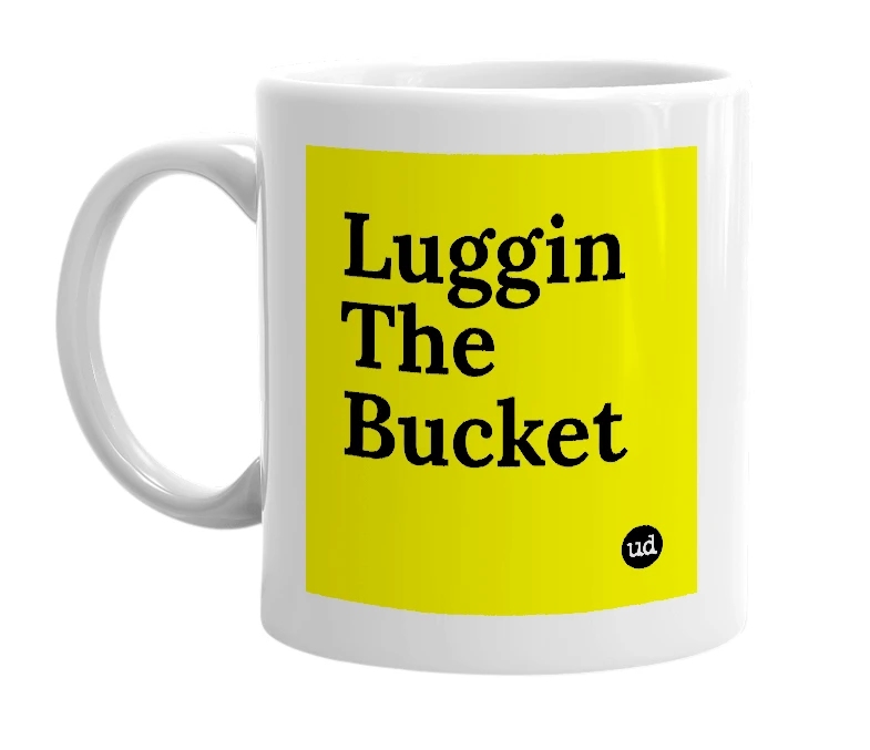 White mug with 'Luggin The Bucket' in bold black letters