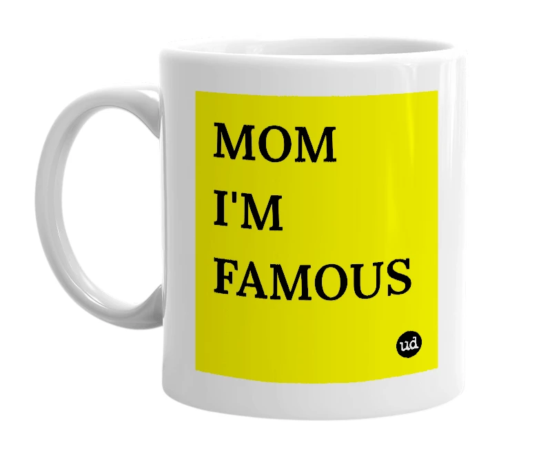 White mug with 'MOM I'M FAMOUS' in bold black letters