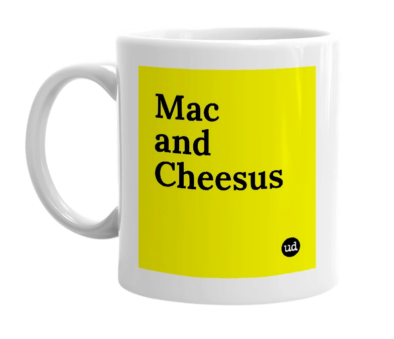 White mug with 'Mac and Cheesus' in bold black letters