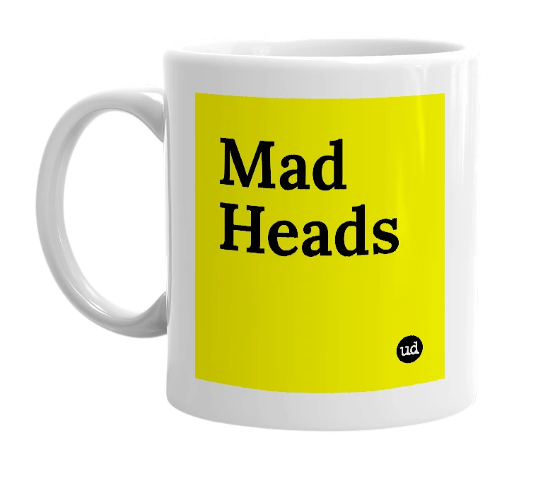 White mug with 'Mad Heads' in bold black letters