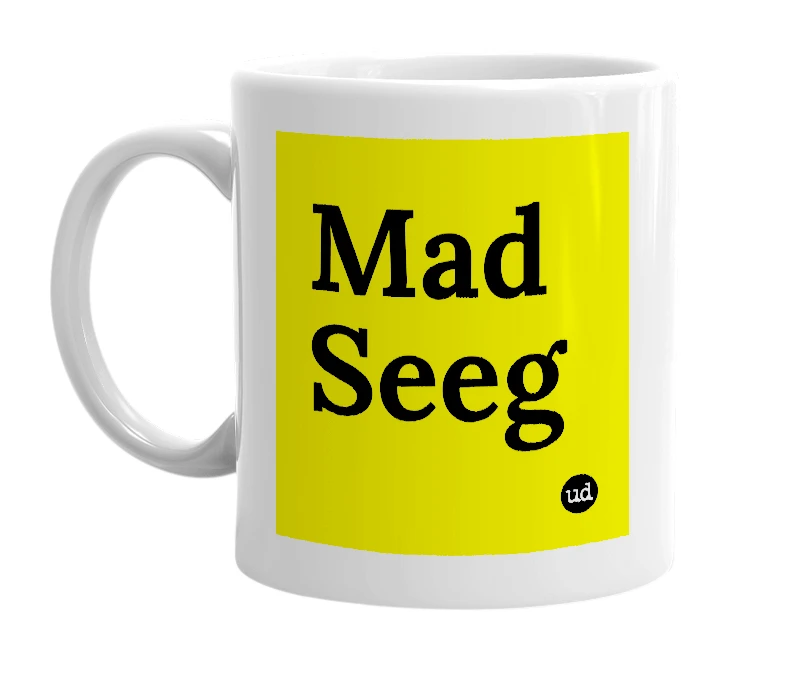 White mug with 'Mad Seeg' in bold black letters