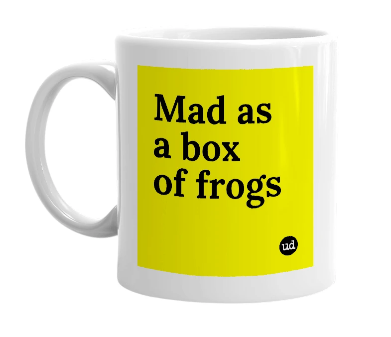 White mug with 'Mad as a box of frogs' in bold black letters