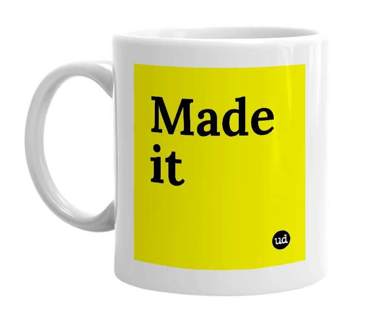 White mug with 'Made it' in bold black letters