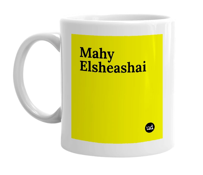 White mug with 'Mahy Elsheashai' in bold black letters