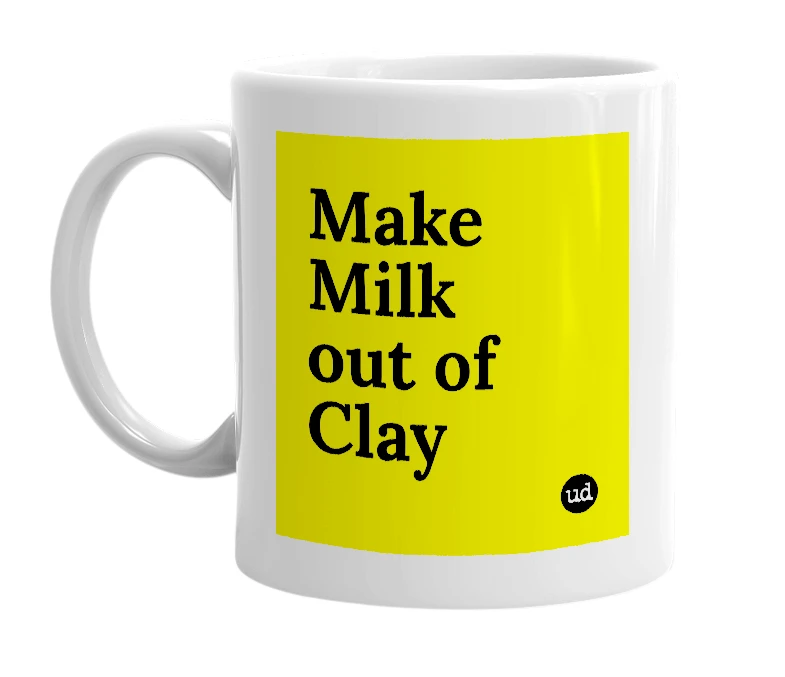 White mug with 'Make Milk out of Clay' in bold black letters