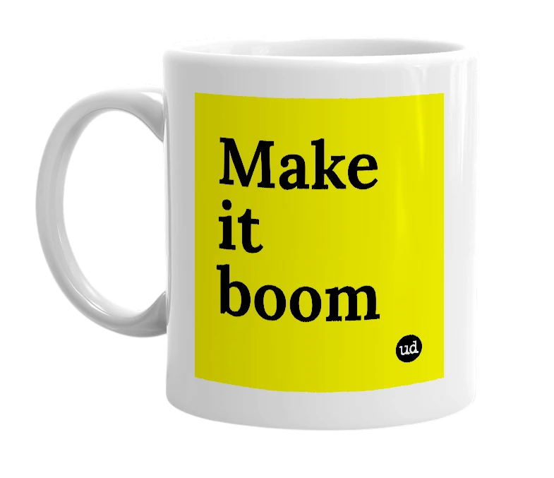 White mug with 'Make it boom' in bold black letters