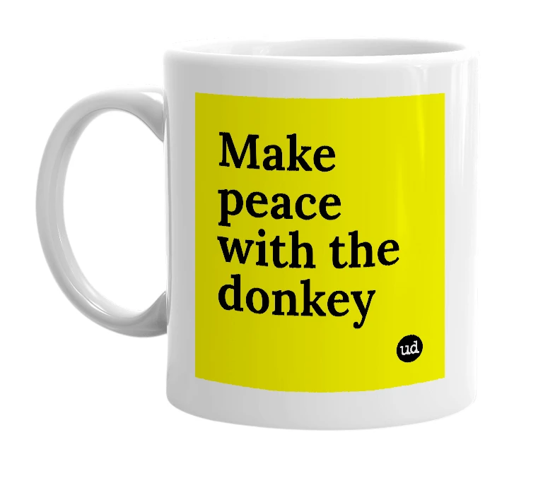 White mug with 'Make peace with the donkey' in bold black letters