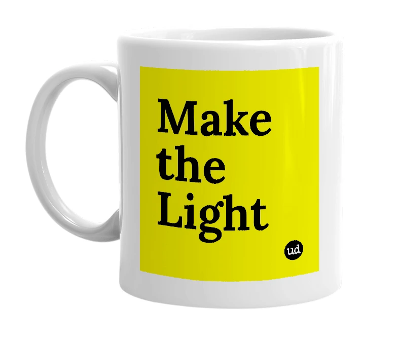 White mug with 'Make the Light' in bold black letters