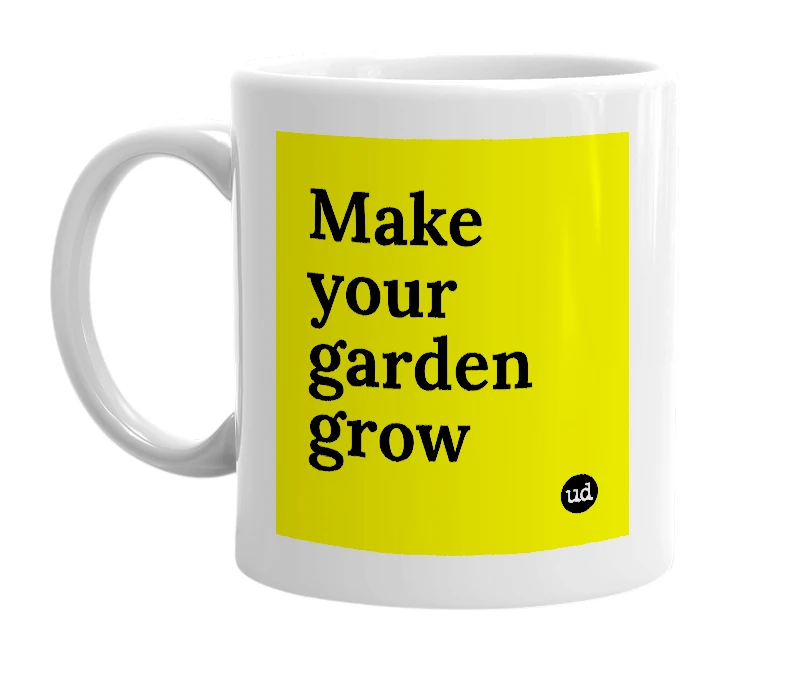 White mug with 'Make your garden grow' in bold black letters