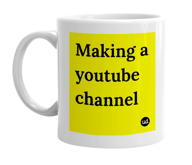 White mug with 'Making a youtube channel' in bold black letters