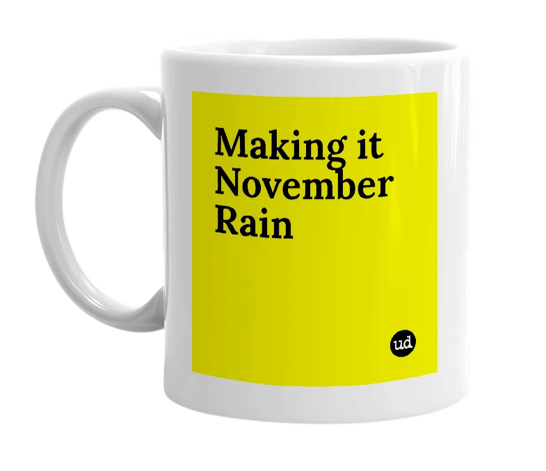 White mug with 'Making it November Rain' in bold black letters