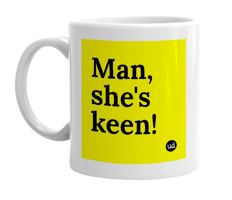 White mug with 'Man, she's keen!' in bold black letters