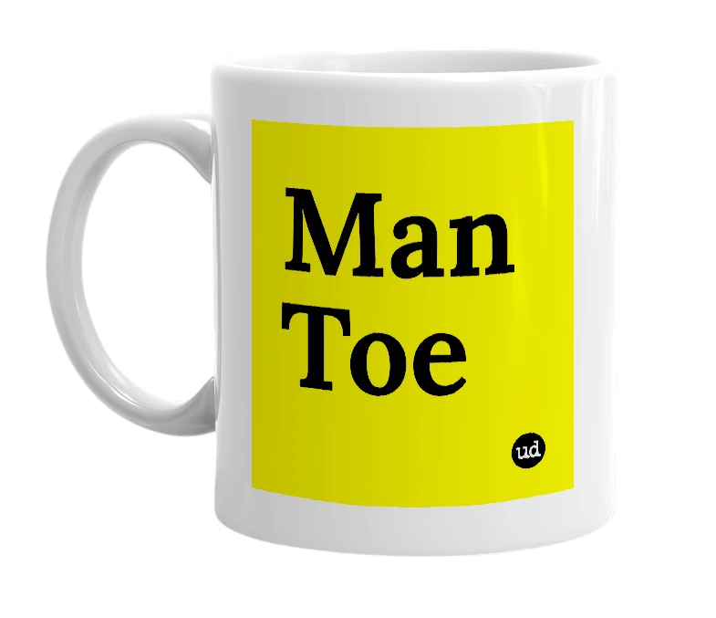 White mug with 'Man Toe' in bold black letters