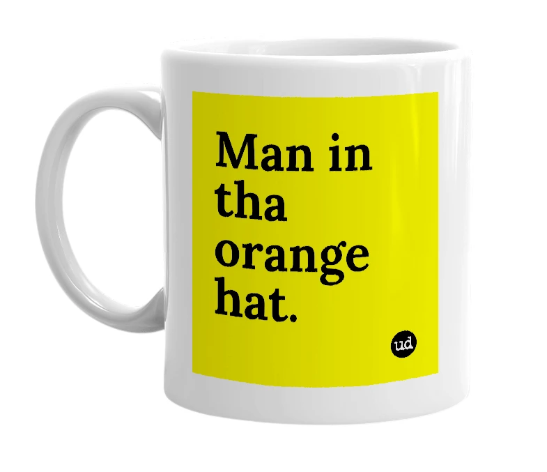 White mug with 'Man in tha orange hat.' in bold black letters