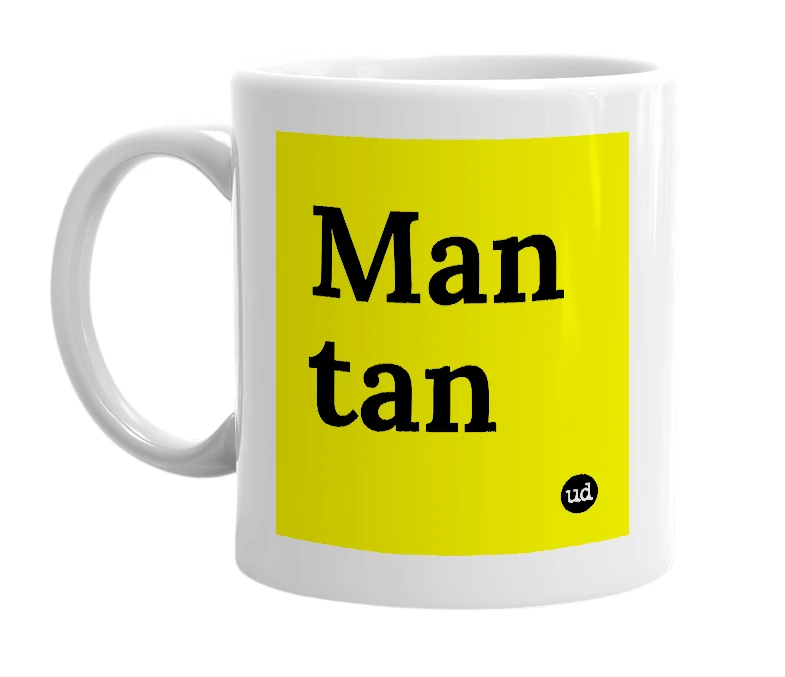 White mug with 'Man tan' in bold black letters