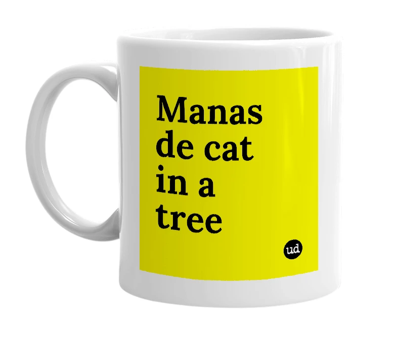 White mug with 'Manas de cat in a tree' in bold black letters