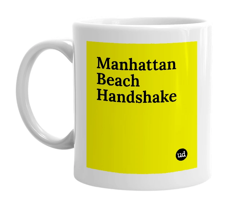White mug with 'Manhattan Beach Handshake' in bold black letters