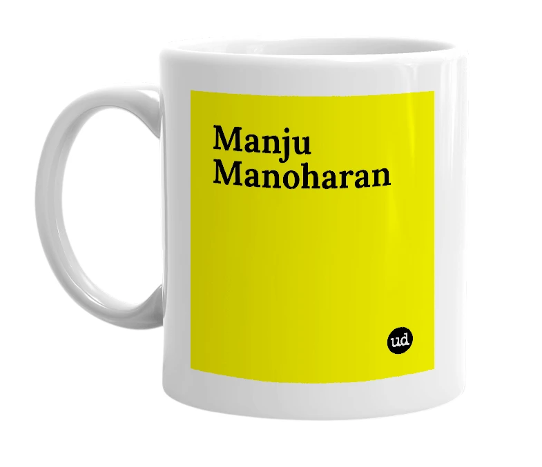 White mug with 'Manju Manoharan' in bold black letters