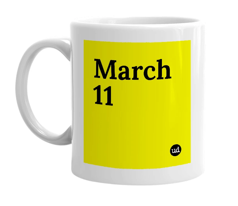 White mug with 'March 11' in bold black letters