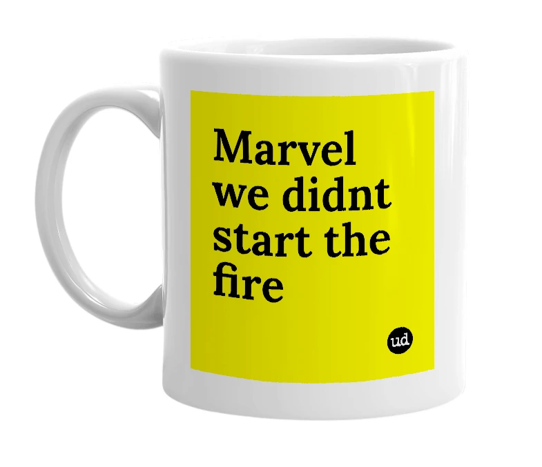 White mug with 'Marvel we didnt start the fire' in bold black letters