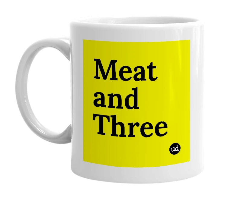 White mug with 'Meat and Three' in bold black letters