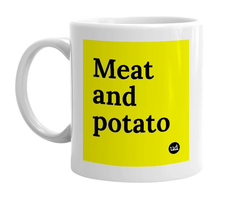 White mug with 'Meat and potato' in bold black letters