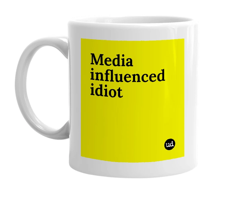 White mug with 'Media influenced idiot' in bold black letters